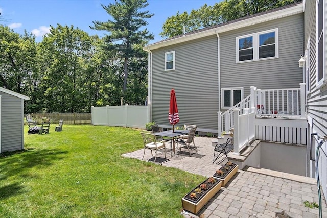 11 Broadway St Unit 2, Stoneham, MA 02180 - back of house featuring a patio and a fenced backyard