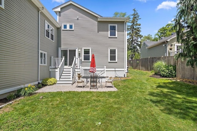 11 Broadway St Unit 2, Stoneham, MA 02180 - rear view of property with a patio