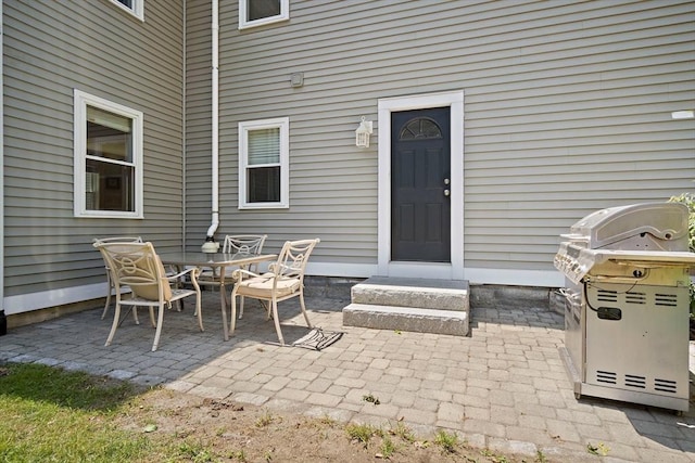 11 Broadway St Unit 2, Stoneham, MA 02180 - view of patio / terrace featuring a grill and outdoor dining area