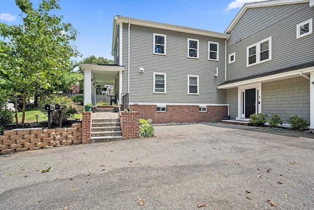 11 Broadway St Unit 2, Stoneham, MA 02180 - view of property exterior with covered porch