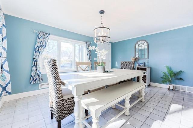 tiled dining space featuring crown molding and a notable chandelier