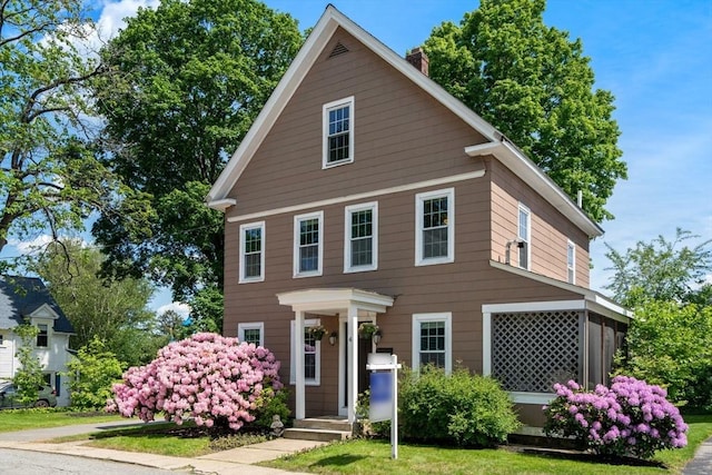 4 Walcott St, Maynard, MA 01754 - view of front of home featuring a chimney