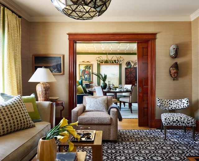 living room featuring wood finished floors and ornamental molding