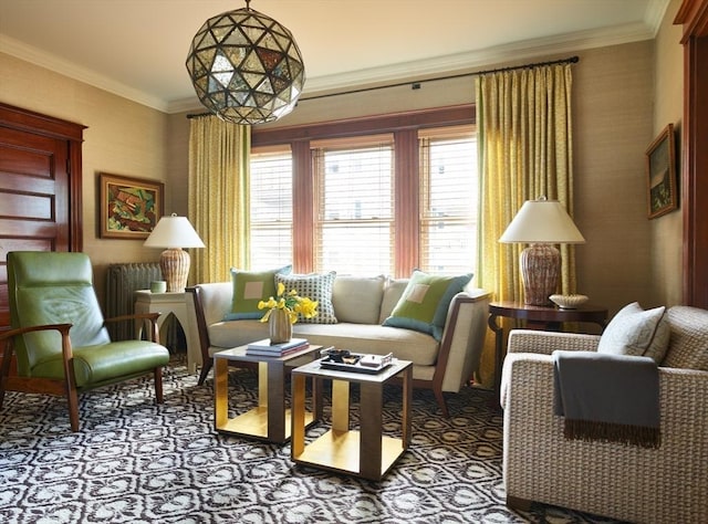 sitting room featuring crown molding, radiator, and carpet