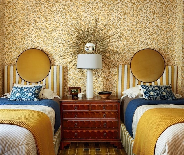 bedroom featuring wallpapered walls