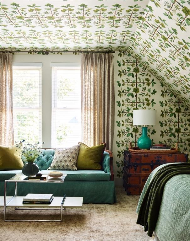 bedroom featuring vaulted ceiling and carpet floors