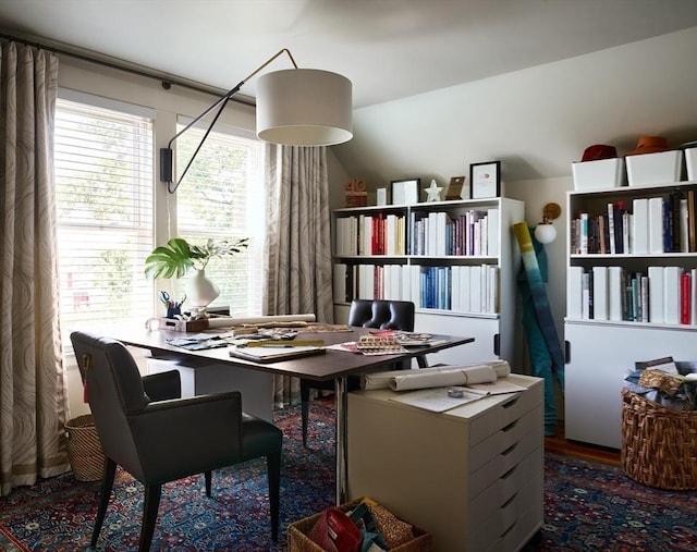 home office featuring vaulted ceiling
