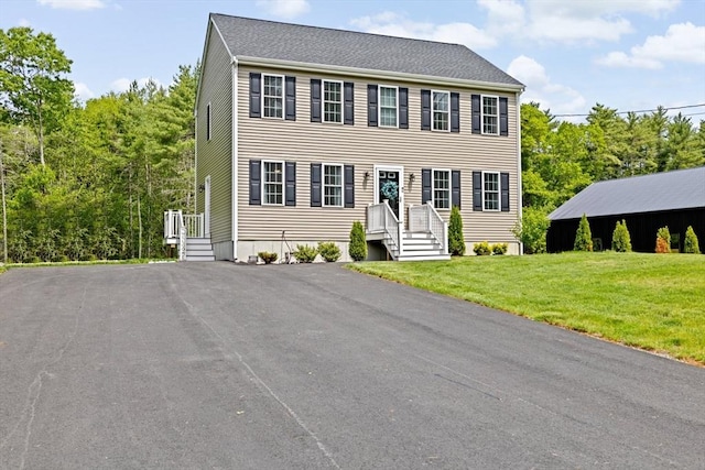 111 Spruce St, Middleboro, MA 02346 - colonial home featuring a front yard