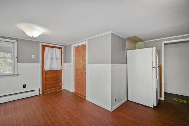 41 Bryant St, Pittsfield, MA 01201 - spare room with ornamental molding, wainscoting, wood finished floors, and a baseboard radiator