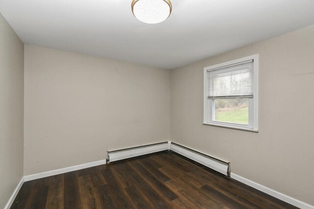 41 Bryant St, Pittsfield, MA 01201 - empty room with a baseboard radiator, wood finished floors, and baseboards
