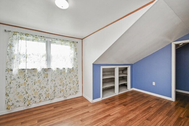 41 Bryant St, Pittsfield, MA 01201 - bonus room with vaulted ceiling, built in features, wood finished floors, and baseboards