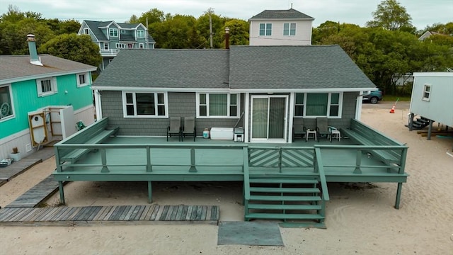 28 Cove St, Fairhaven, MA 02719 - rear view of house with a shingled roof, a wooden deck, and stairs