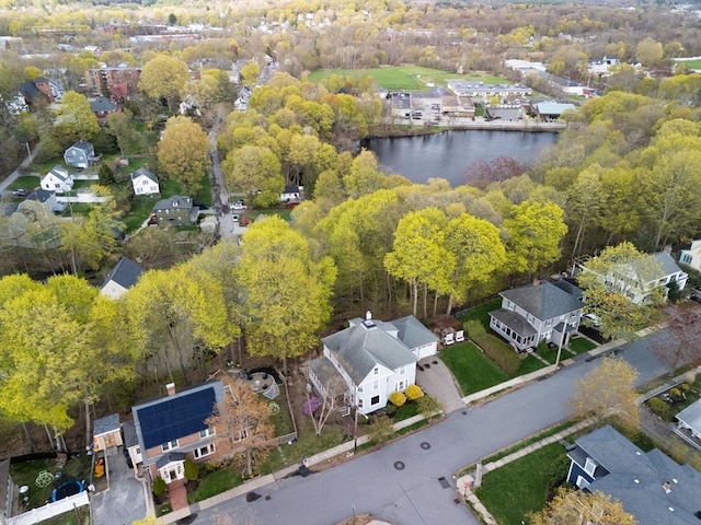 bird's eye view featuring a water view and a residential view