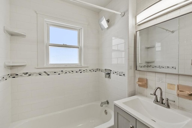 full bathroom featuring shower / tub combination, decorative backsplash, tile walls, and vanity