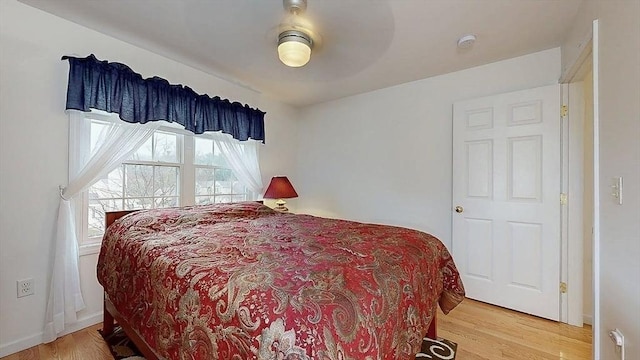 bedroom featuring light wood-style floors