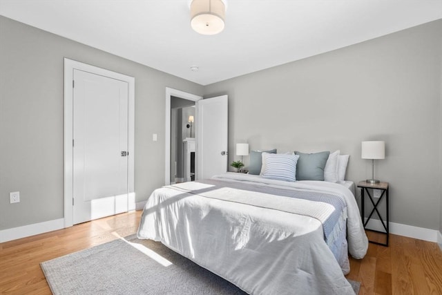 bedroom featuring hardwood / wood-style floors