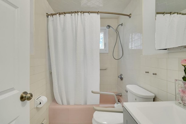 10-12 Spring Rd, Arlington, MA 02476 - full bath featuring tile walls, vanity, and shower / bath combo