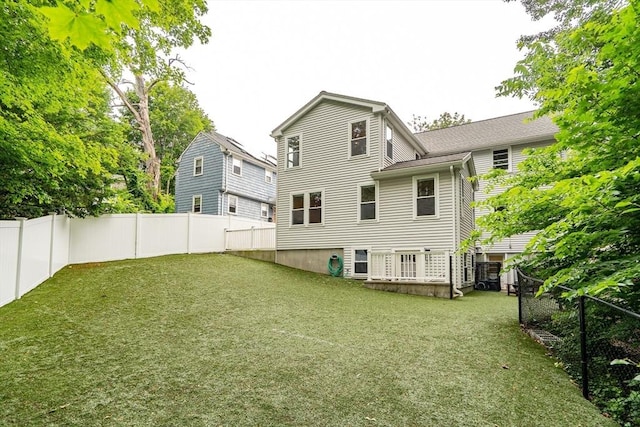 10-12 Spring Rd, Arlington, MA 02476 - rear view of property featuring a fenced backyard