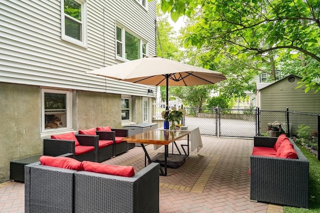 10-12 Spring Rd, Arlington, MA 02476 - view of patio featuring an outdoor hangout area and a gate