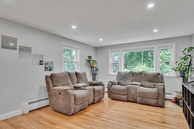 10-12 Spring Rd, Arlington, MA 02476 - living room featuring a baseboard radiator, light wood-type flooring, and recessed lighting