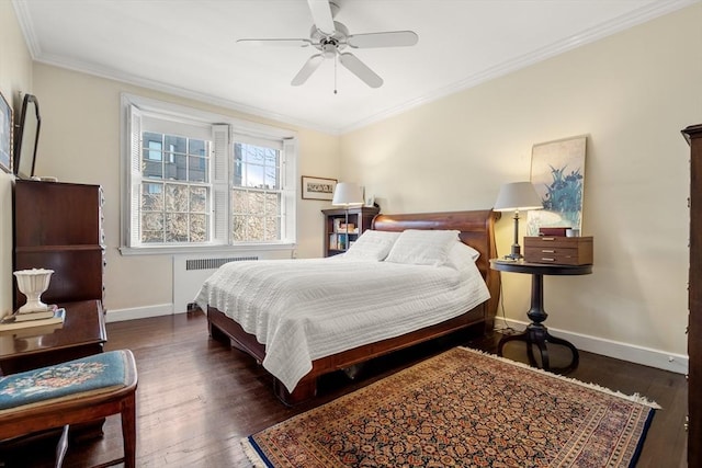 bedroom featuring ceiling fan, radiator heating unit, ornamental molding, and dark wood-type flooring