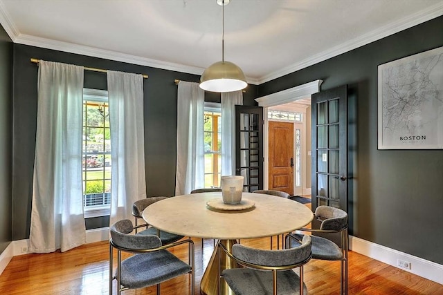 19 Mulberry Ln, Franklin, MA 02038 - dining room with baseboards, wood finished floors, and crown molding