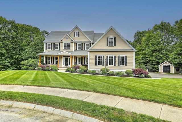 19 Mulberry Ln, Franklin, MA 02038 - colonial home featuring a porch, a front lawn, and an outdoor structure