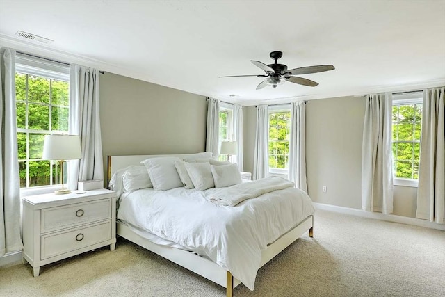 19 Mulberry Ln, Franklin, MA 02038 - bedroom with multiple windows, light colored carpet, and a ceiling fan