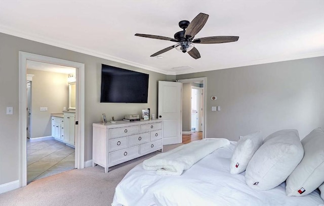 19 Mulberry Ln, Franklin, MA 02038 - bedroom with crown molding, baseboards, ensuite bath, light colored carpet, and a ceiling fan