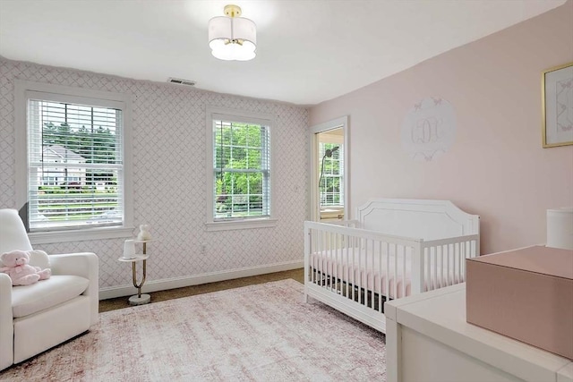 19 Mulberry Ln, Franklin, MA 02038 - bedroom with baseboards and a nursery area