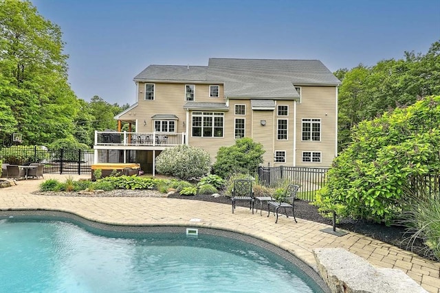 19 Mulberry Ln, Franklin, MA 02038 - view of swimming pool featuring a patio and a hot tub