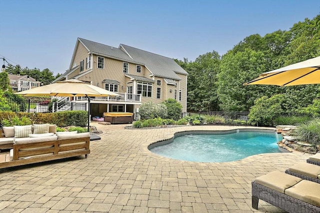 19 Mulberry Ln, Franklin, MA 02038 - view of swimming pool featuring a hot tub, a patio area, an outdoor living space, and a fenced backyard