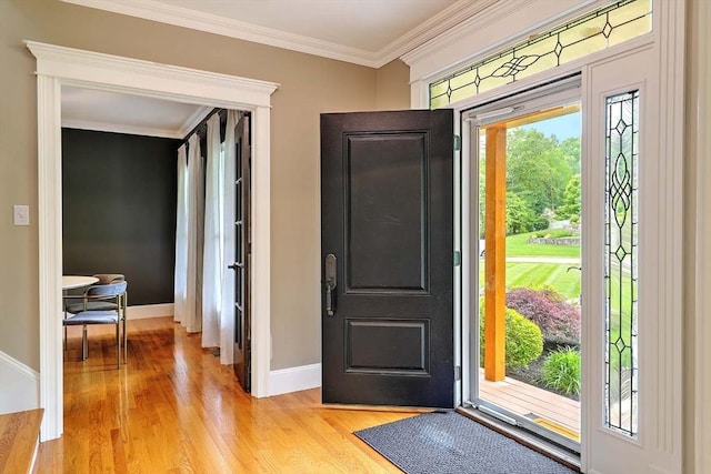 19 Mulberry Ln, Franklin, MA 02038 - foyer entrance with light wood-style floors, baseboards, and ornamental molding