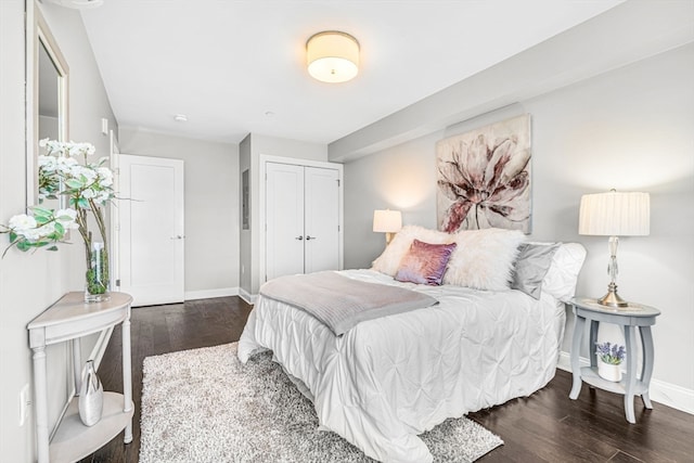 bedroom featuring dark hardwood / wood-style flooring