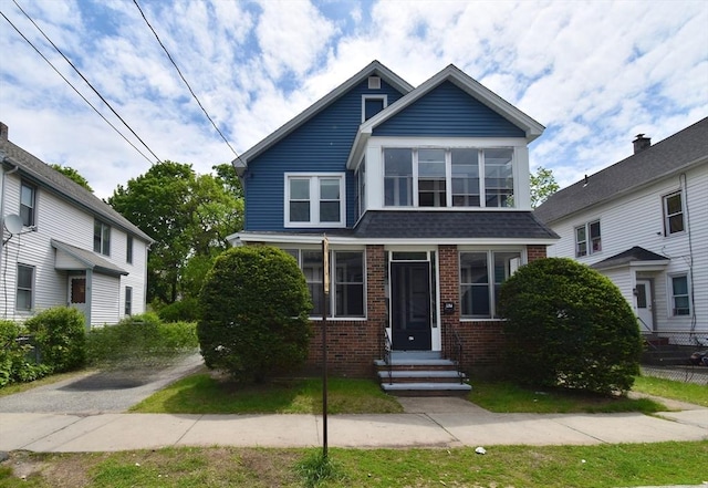 view of front facade with brick siding