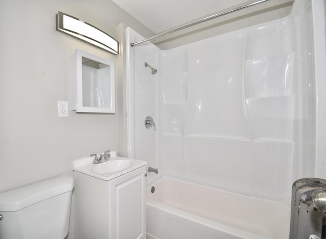 bathroom with  shower combination, toilet, and vanity