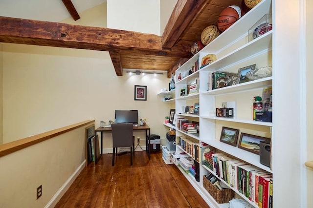 home office with dark wood-type flooring and vaulted ceiling with beams