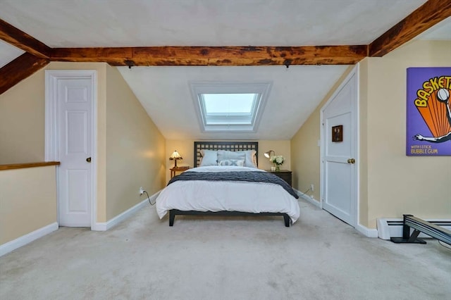 unfurnished bedroom featuring light colored carpet and lofted ceiling with skylight