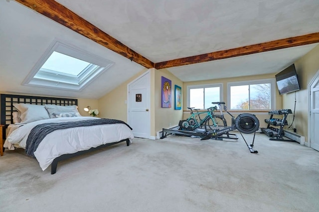 bedroom featuring light colored carpet and lofted ceiling with skylight