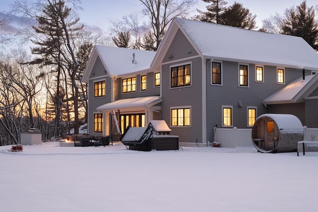 view of snow covered house