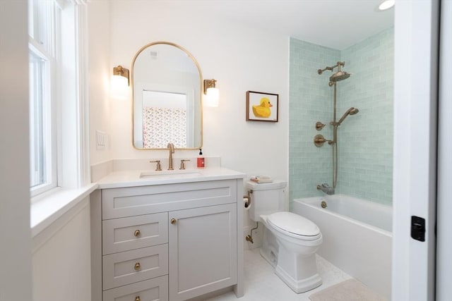 bathroom with shower / bathing tub combination, vanity, and toilet