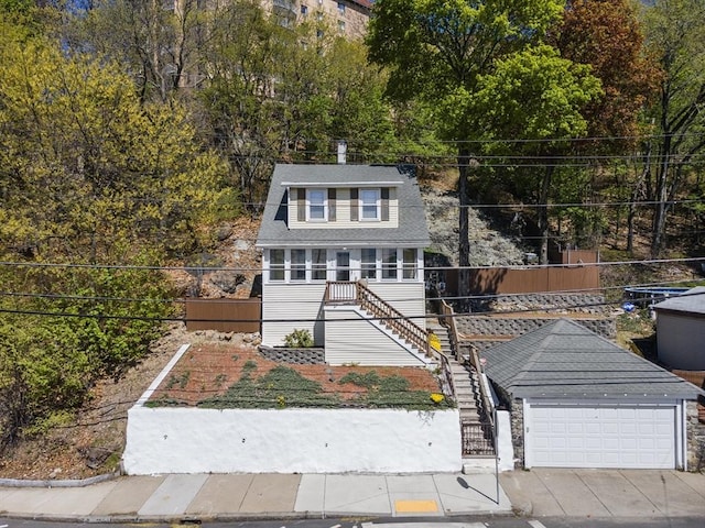 view of front of house with stairway