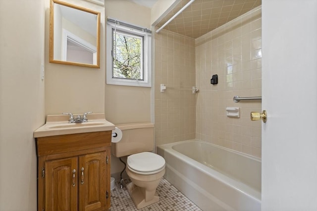 full bathroom with toilet, vanity, tile patterned floors, and washtub / shower combination