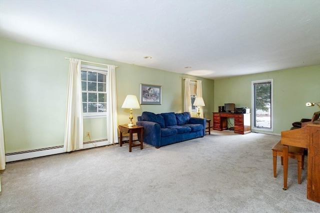 carpeted living room featuring a baseboard radiator