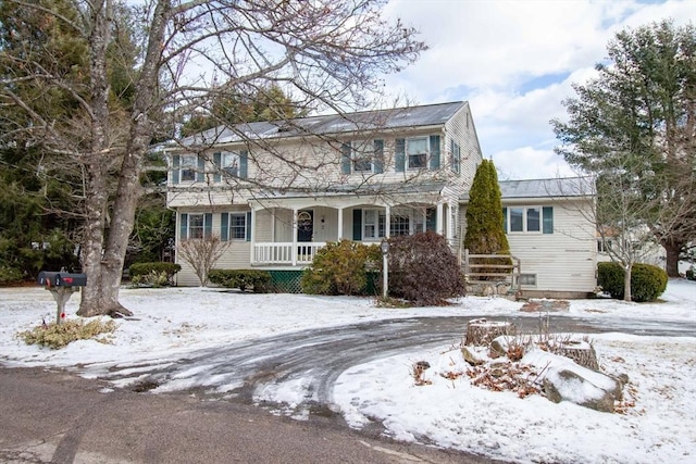 colonial home with covered porch