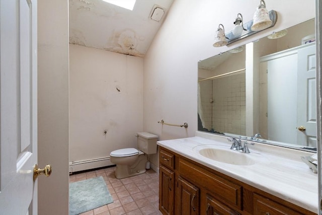 bathroom with lofted ceiling, vanity, a baseboard heating unit, toilet, and tile patterned floors