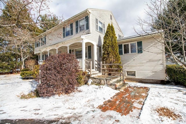 view of front of property featuring covered porch