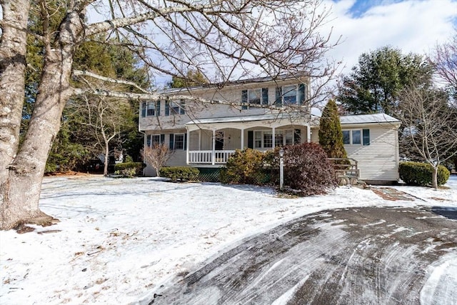 view of property with covered porch