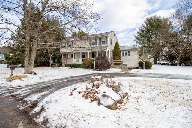 front of property with a porch