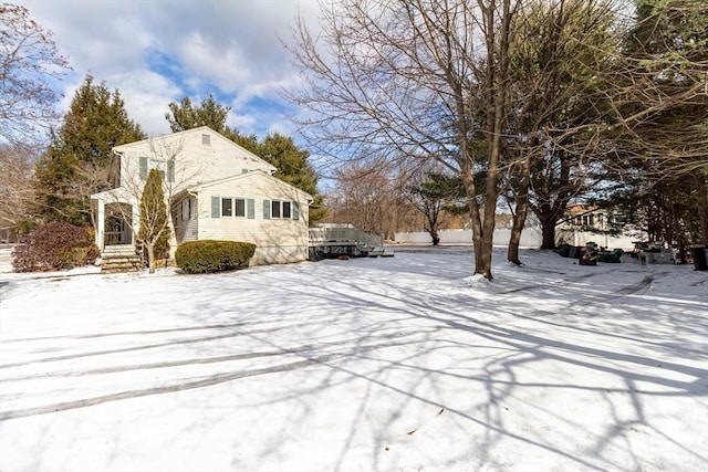 view of snow covered property